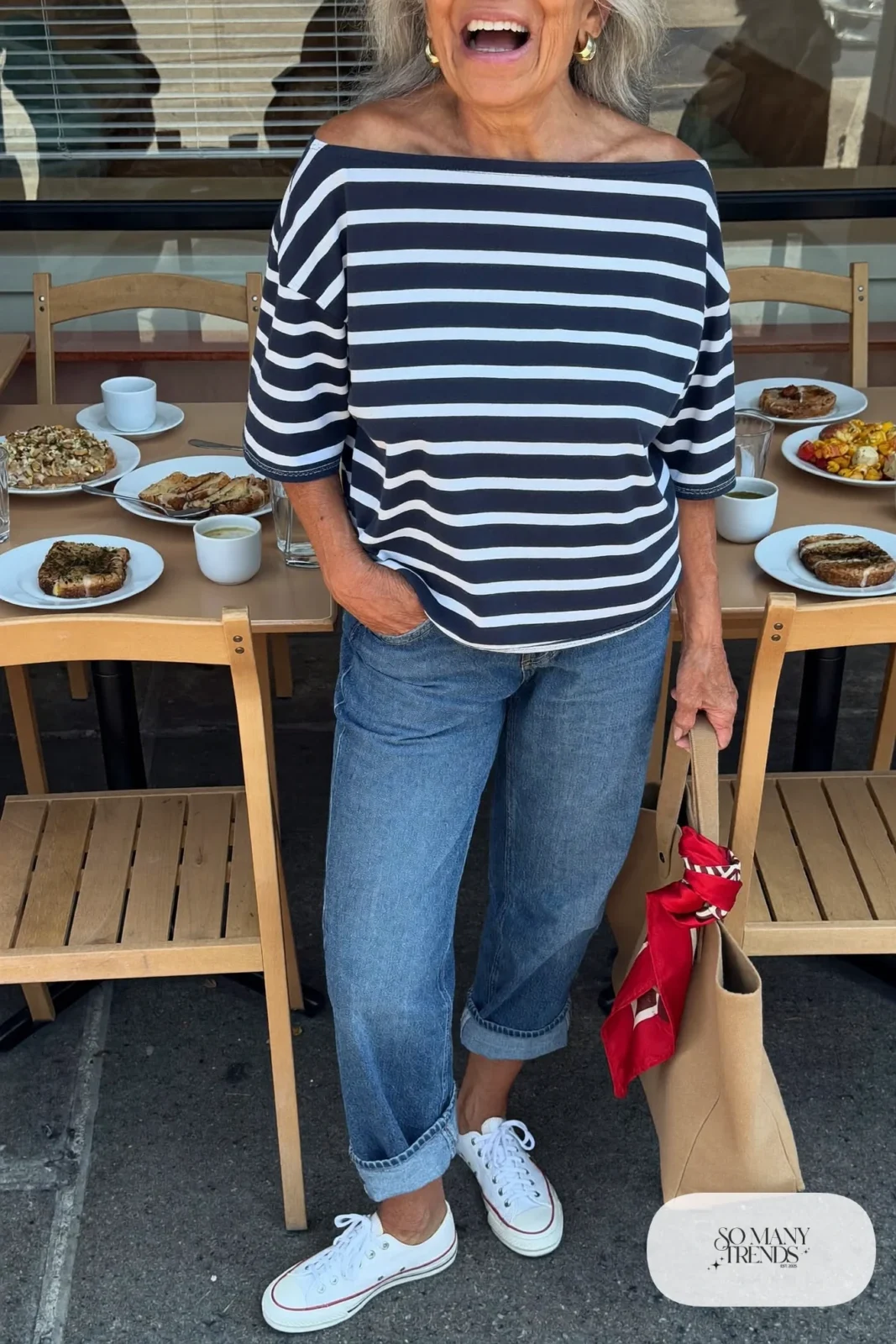 navy striped boat-neck top with straight jeans, white sneakers and red scarf on tote bag outfit 7
