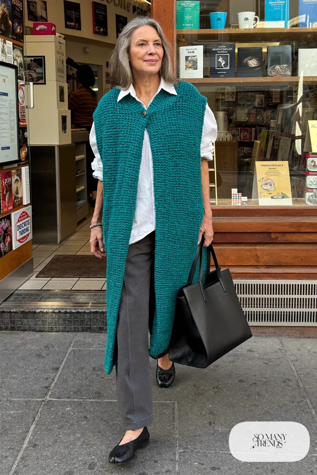 long teal knit vest over white shirt with gray ankle pants and black leather flats outfit 10