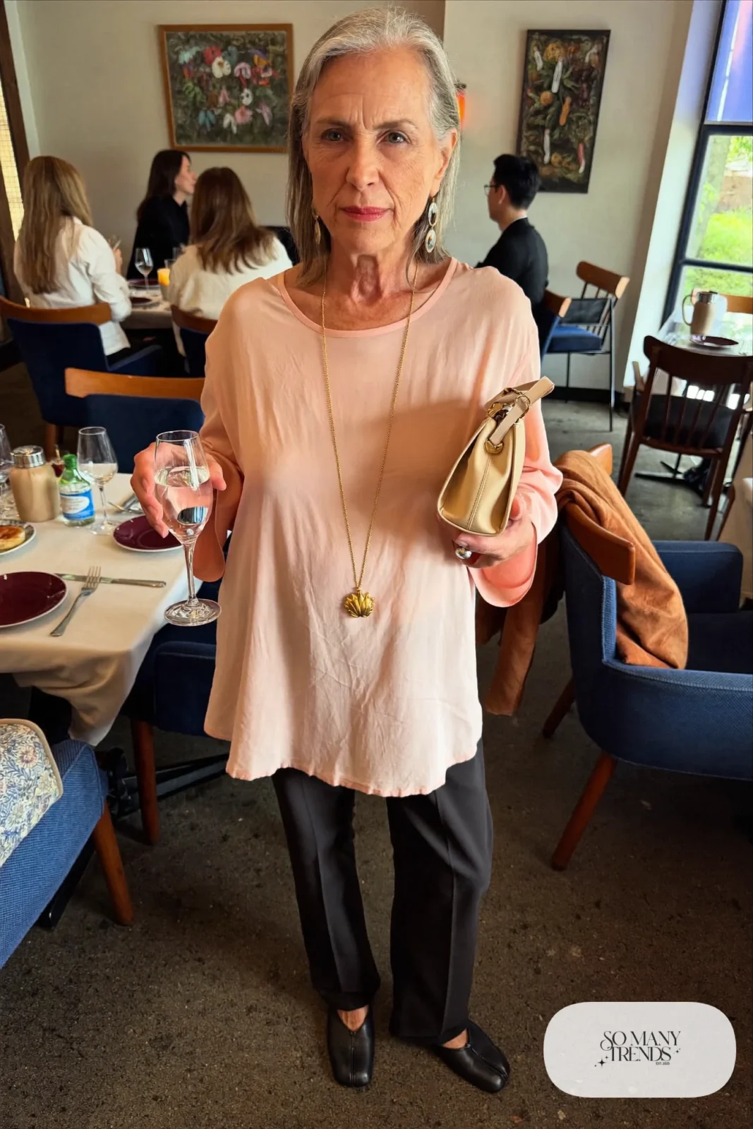 black pull-on pants with blush silk blouse, long gold pendant and black flats outfit 11