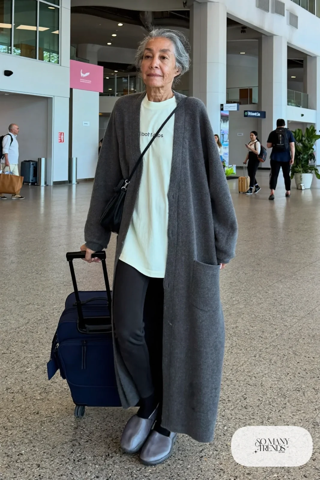 black stretch straight pants with cream tee, long charcoal cardigan and gray slip-on sneakers outfit 20