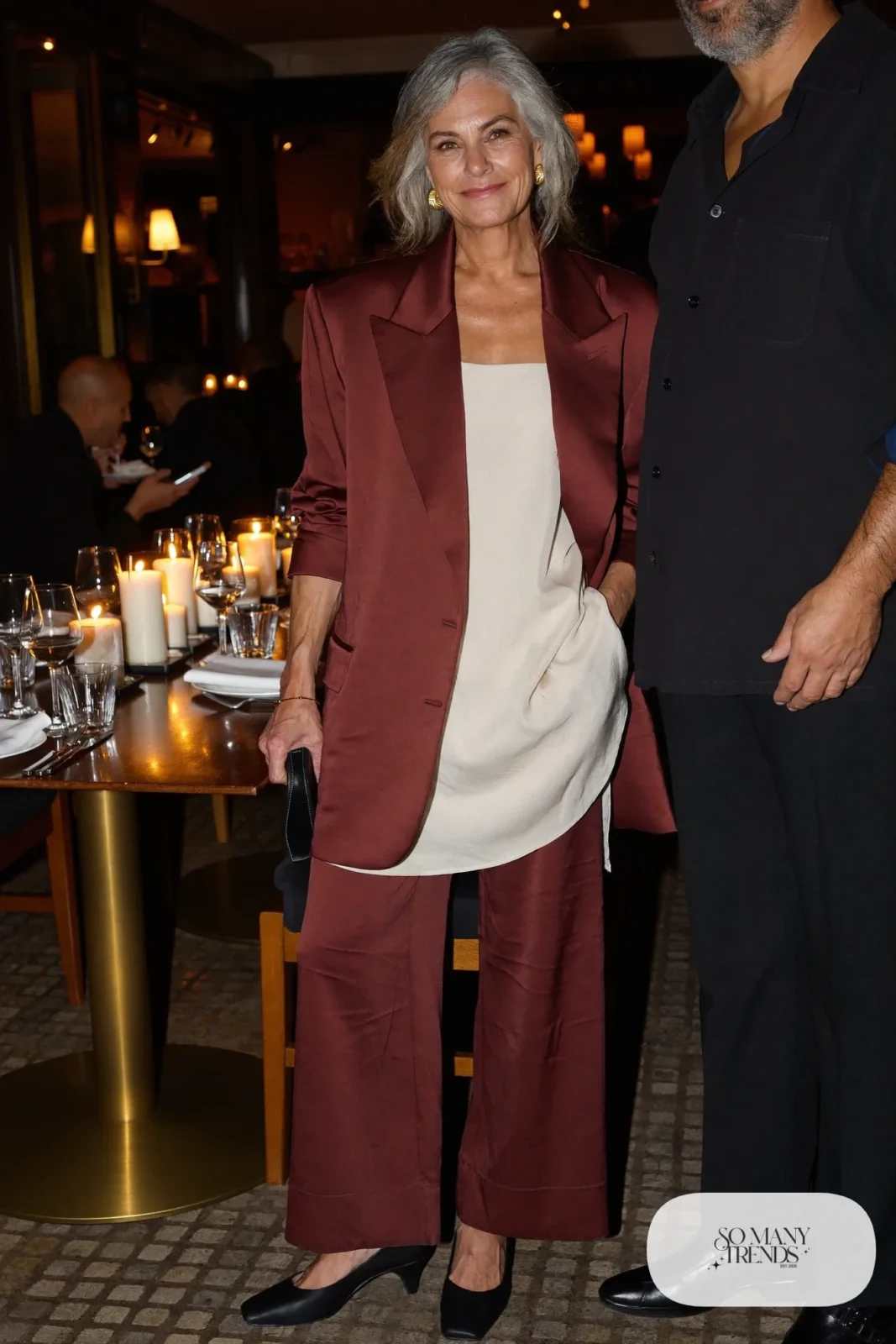 burgundy satin-feel pantsuit with cream camisole, gold hoops and black block-heel pumps outfit 28