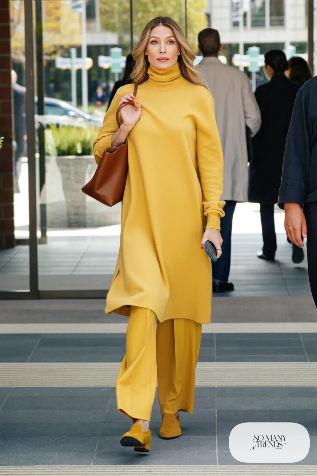 woman in mustard turtleneck, wide-leg pants and block heel loafers outfit 19