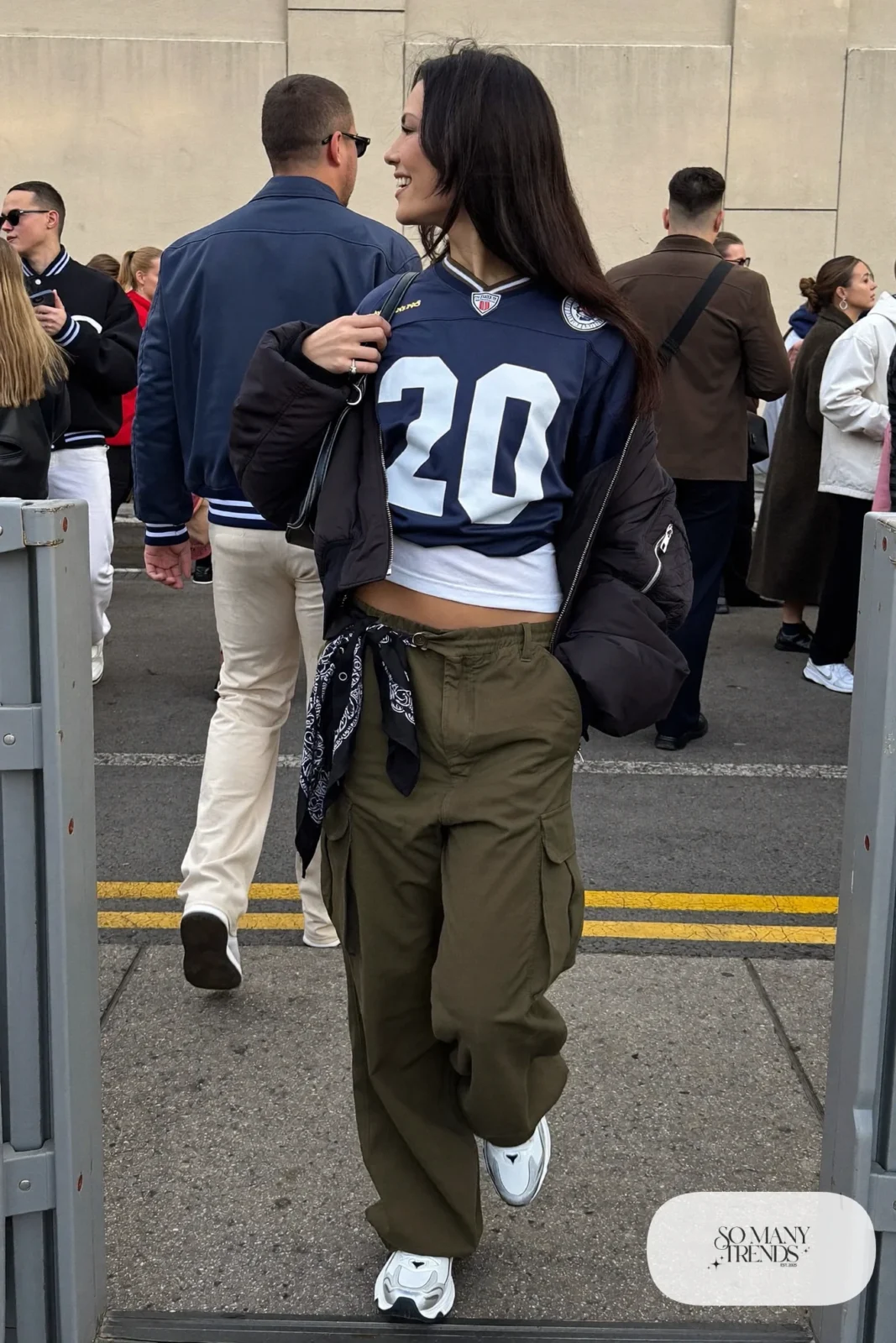 knotted navy football jersey olive cargo pants black bomber jacket chunky sneakers bandana outfit 2