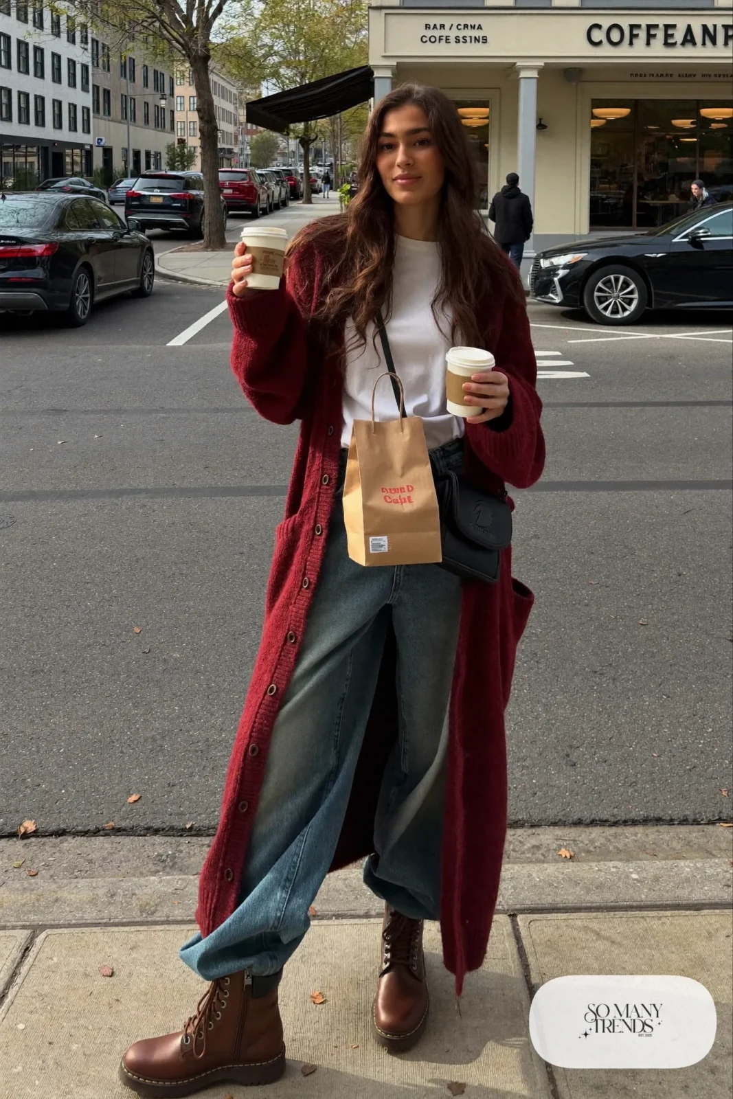 long burgundy chunky cardigan white tee baggy jeans brown boots crossbody bag outfit 3