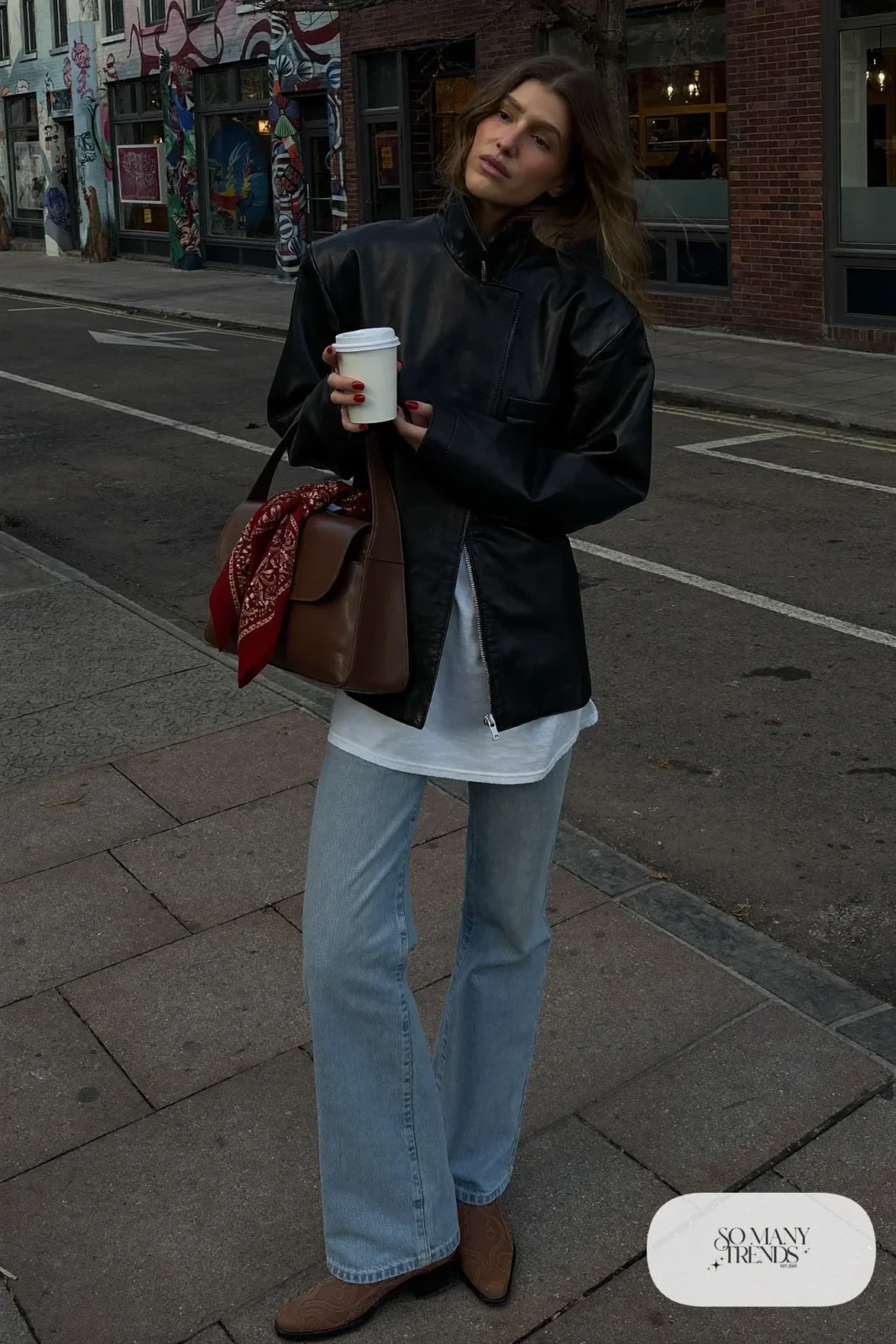 light wash straight jeans black leather jacket white tee silk scarf on bag tan boots nashville outfit 9