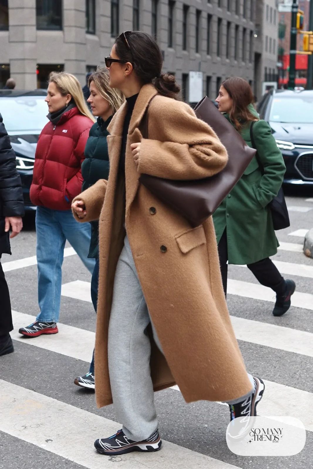 long camel wool coat, black turtleneck, gray sweatpants, charcoal Salomon XT-6 sneakers, leather tote outfit 4