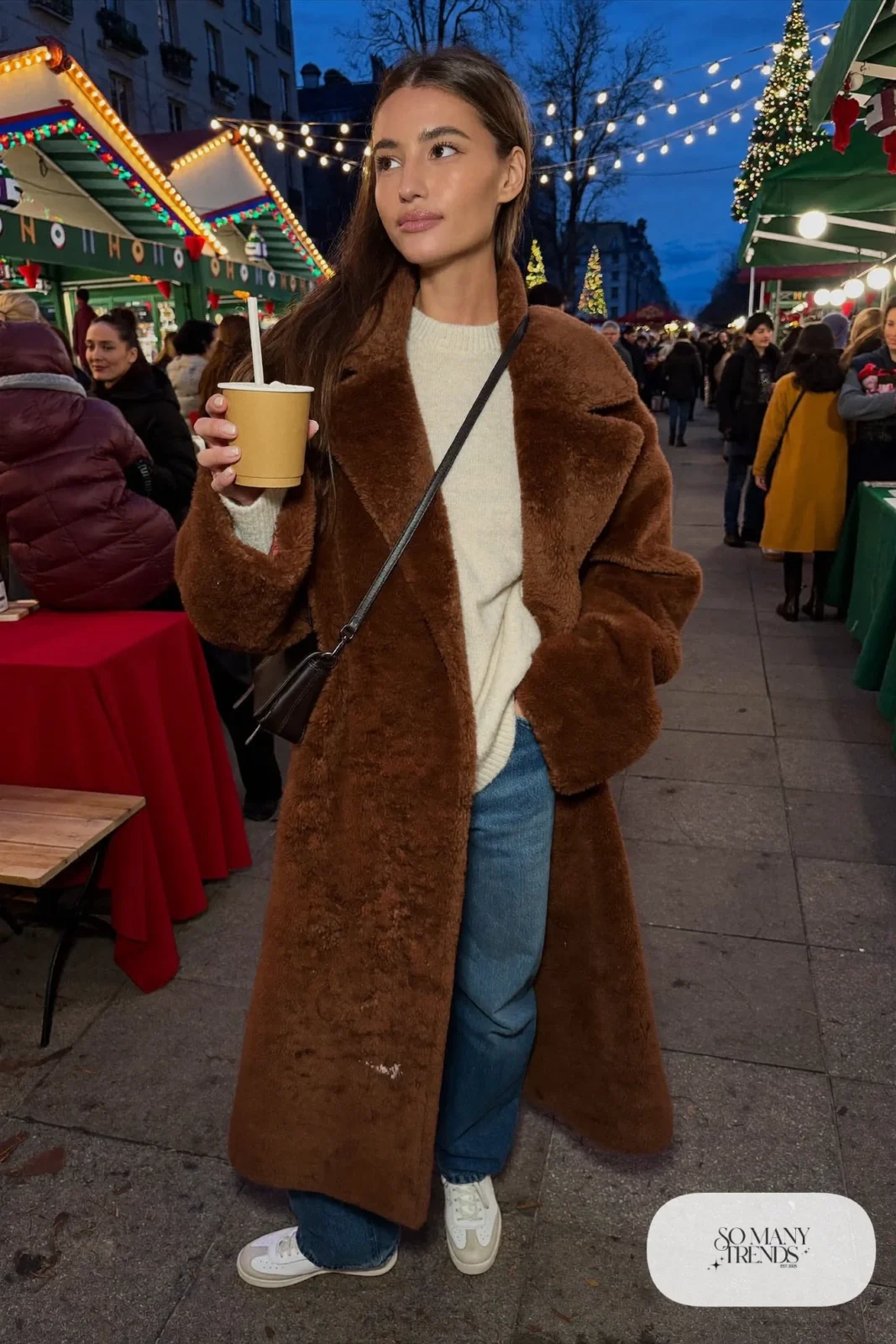 camel teddy coat knee length straight blue jeans white sweater white sneakers black crossbody outfit 16