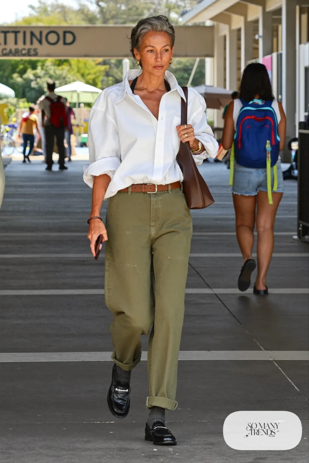 olive straight cargo pants crisp white shirt brown belt loafers shoulder bag outfit 13