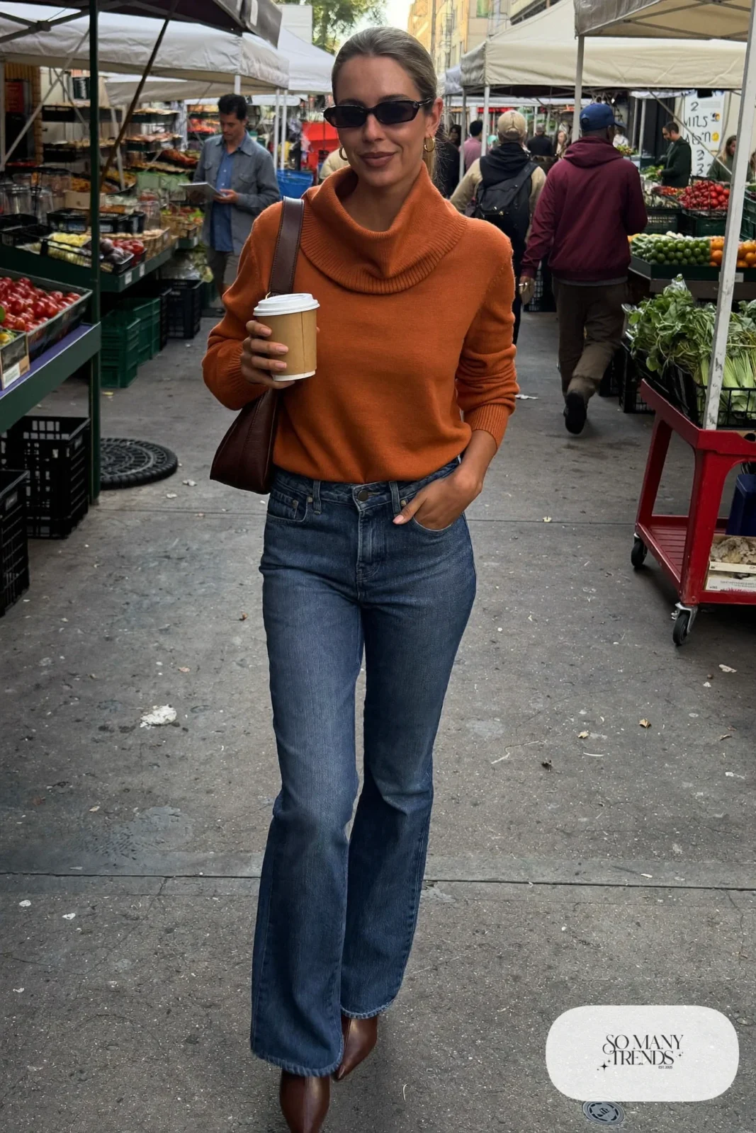 mid-wash flared jeans rust cowl neck sweater brown pointed boots shoulder bag outfit 23