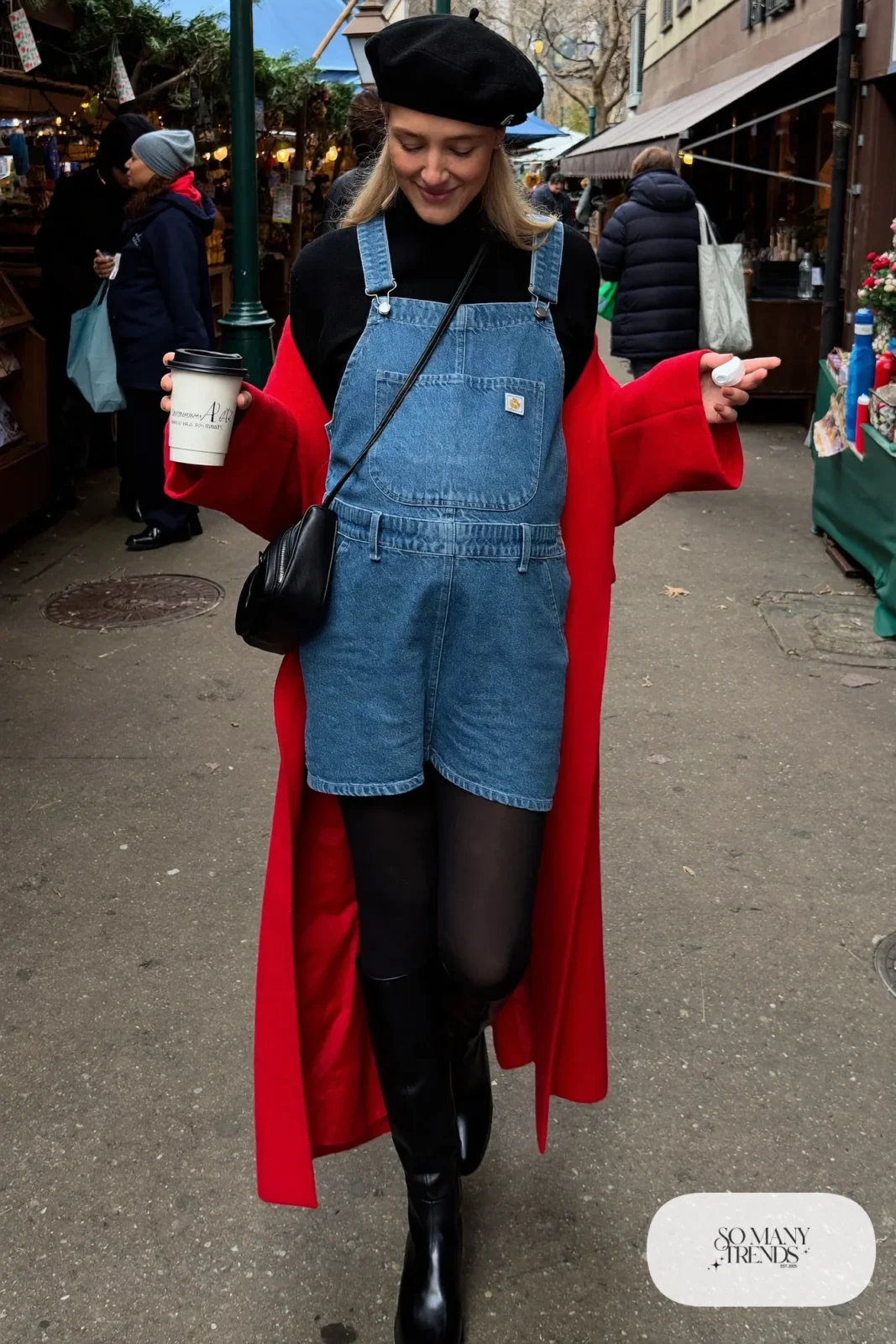 pregnant woman in denim overall dress, black turtleneck, cherry red wool coat and black tall boots, outfit 19