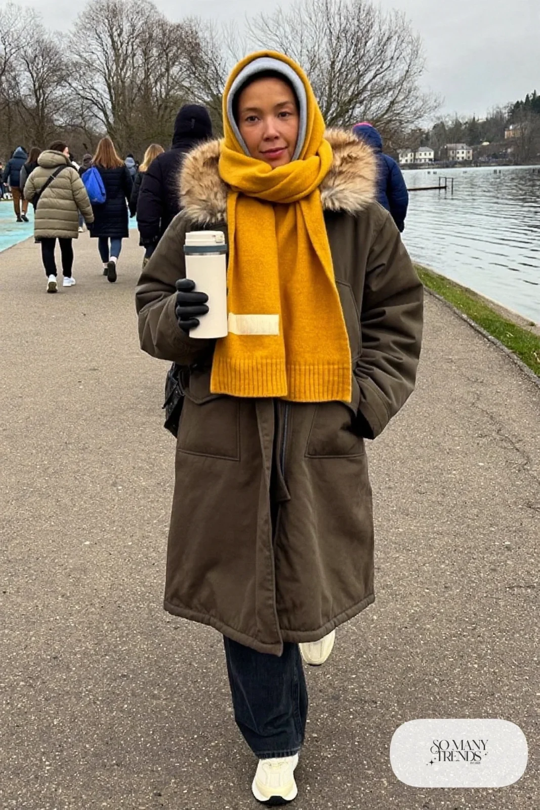 olive hooded parka mustard scarf gray hoodie straight jeans chunky sneakers outfit 18
