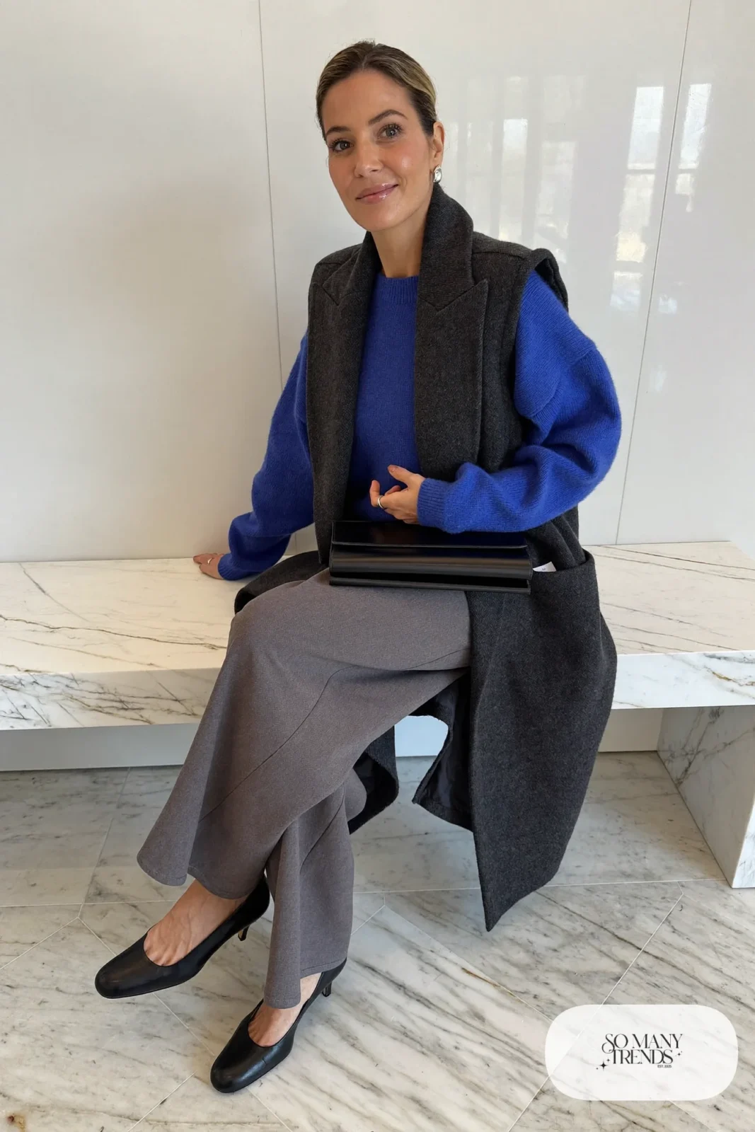 cobalt blue sweater gray wide-leg pants long vest black pumps office outfit 3