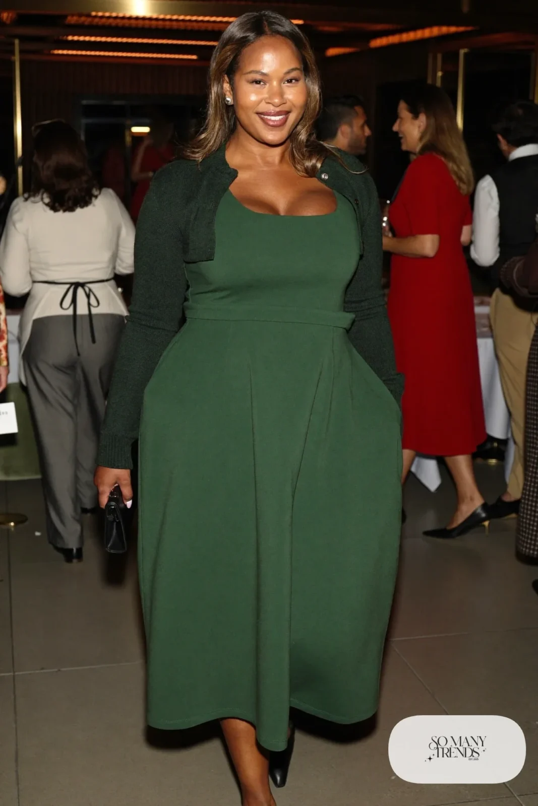 forest green seamed midi dress cropped knit shrug black pointed flats clutch outfit 11