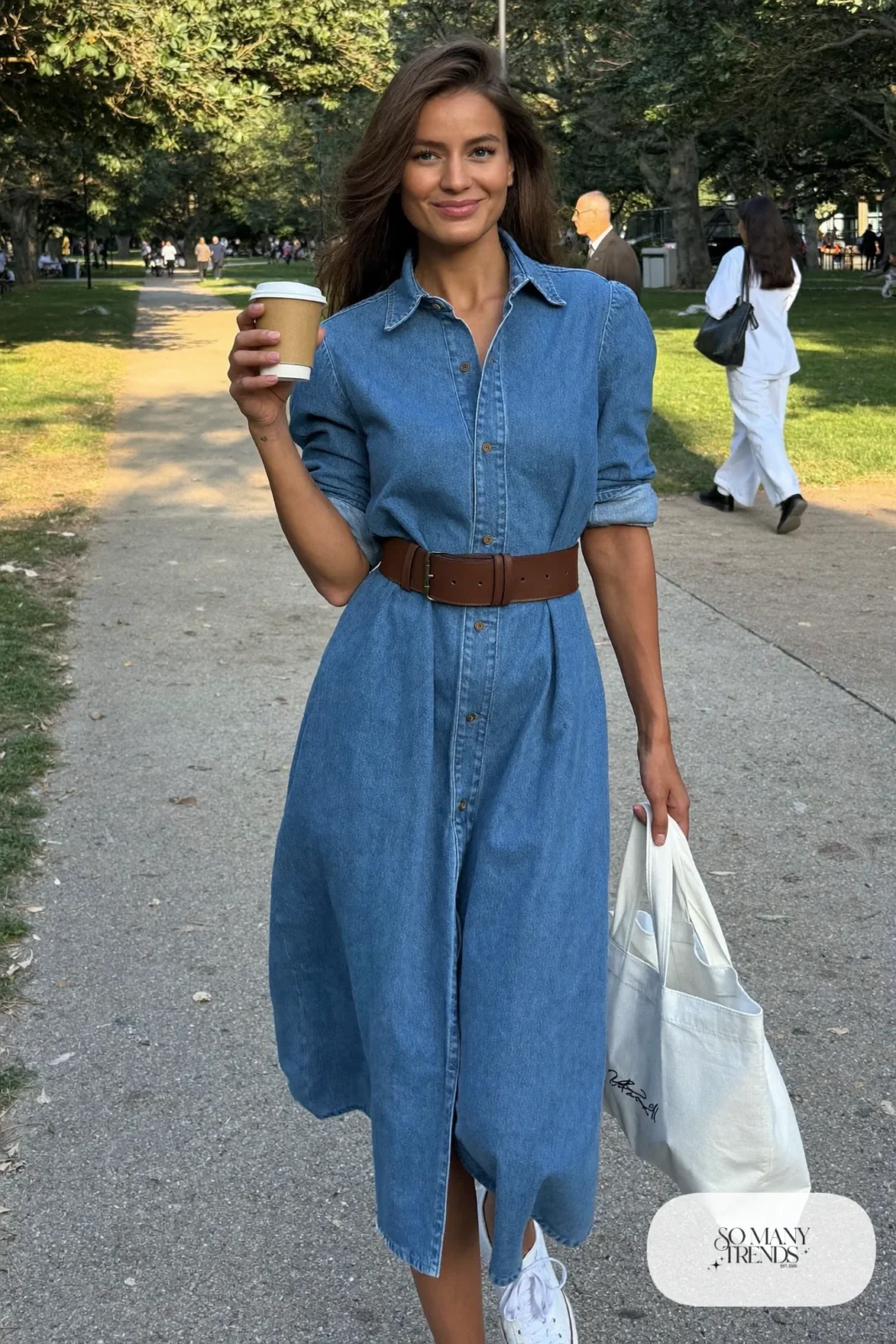 mid-wash denim shirt dress wide brown belt white sneakers canvas tote outfit 17