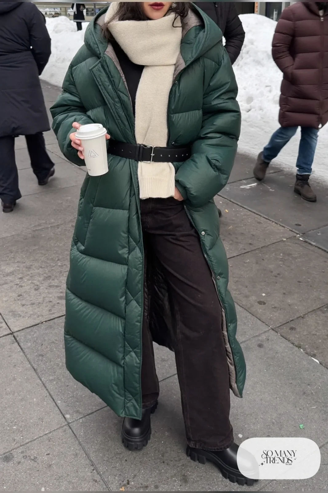 forest green long belted puffer coat black pants chunky lug-sole boots knit scarf outfit 23