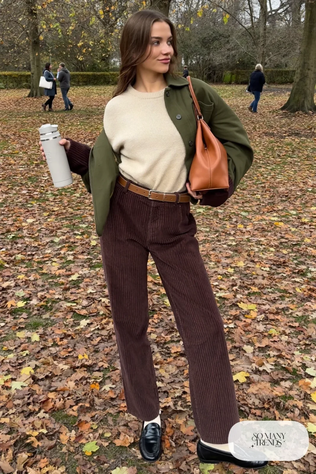 chocolate corduroy high-waisted pants cream cashmere knit tucked tan belt loafers visible socks outfit 27