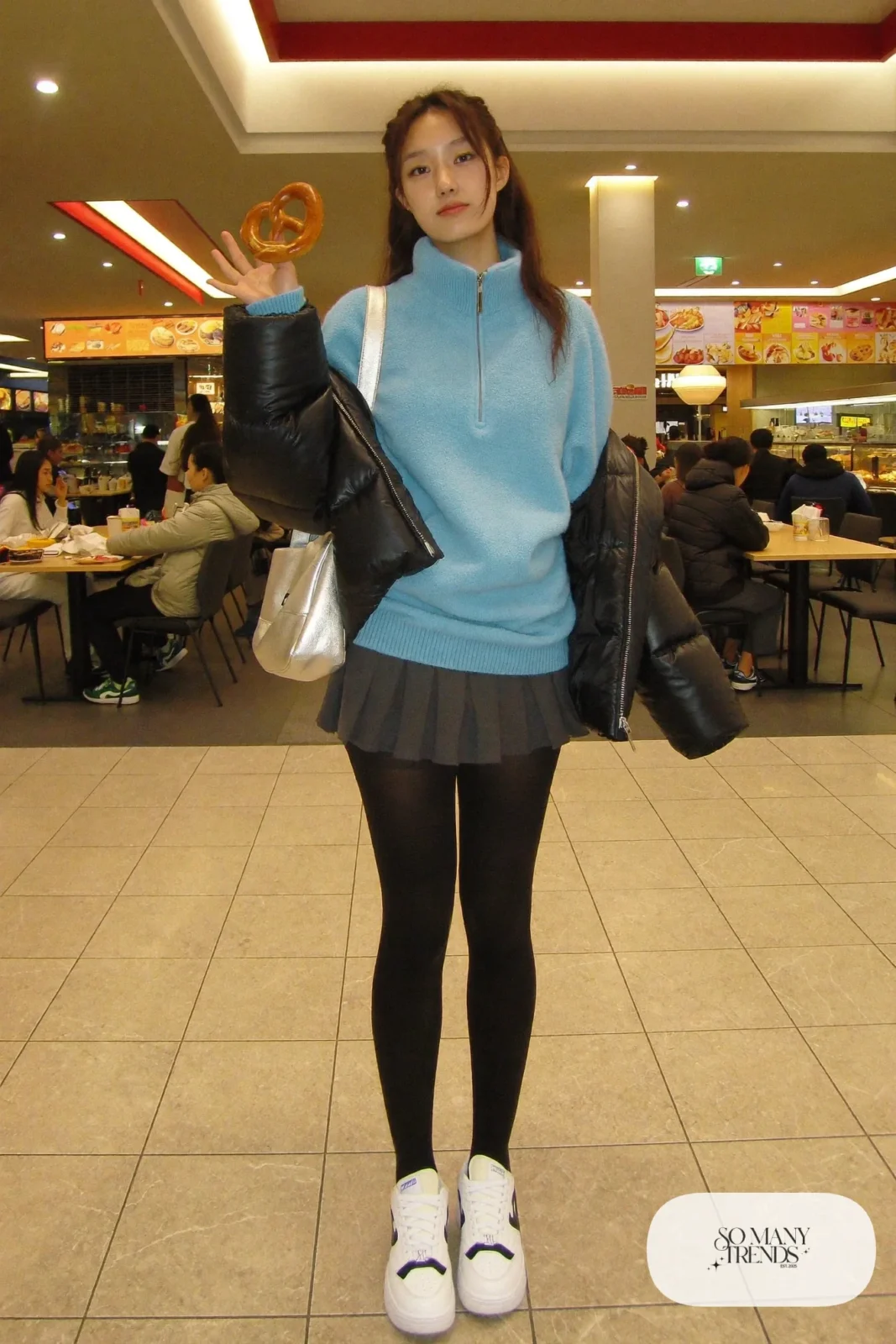 baby blue half-zip fleece gray pleated mini skirt black tights white sneakers puffer coat mini bag outfit 23