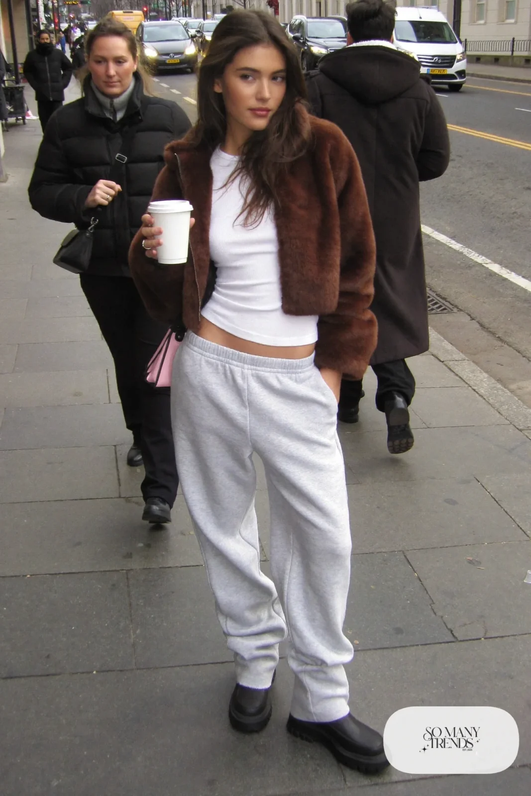cropped chocolate faux fur jacket fitted white tee gray low-rise sweatpants lug sole boots outfit 13