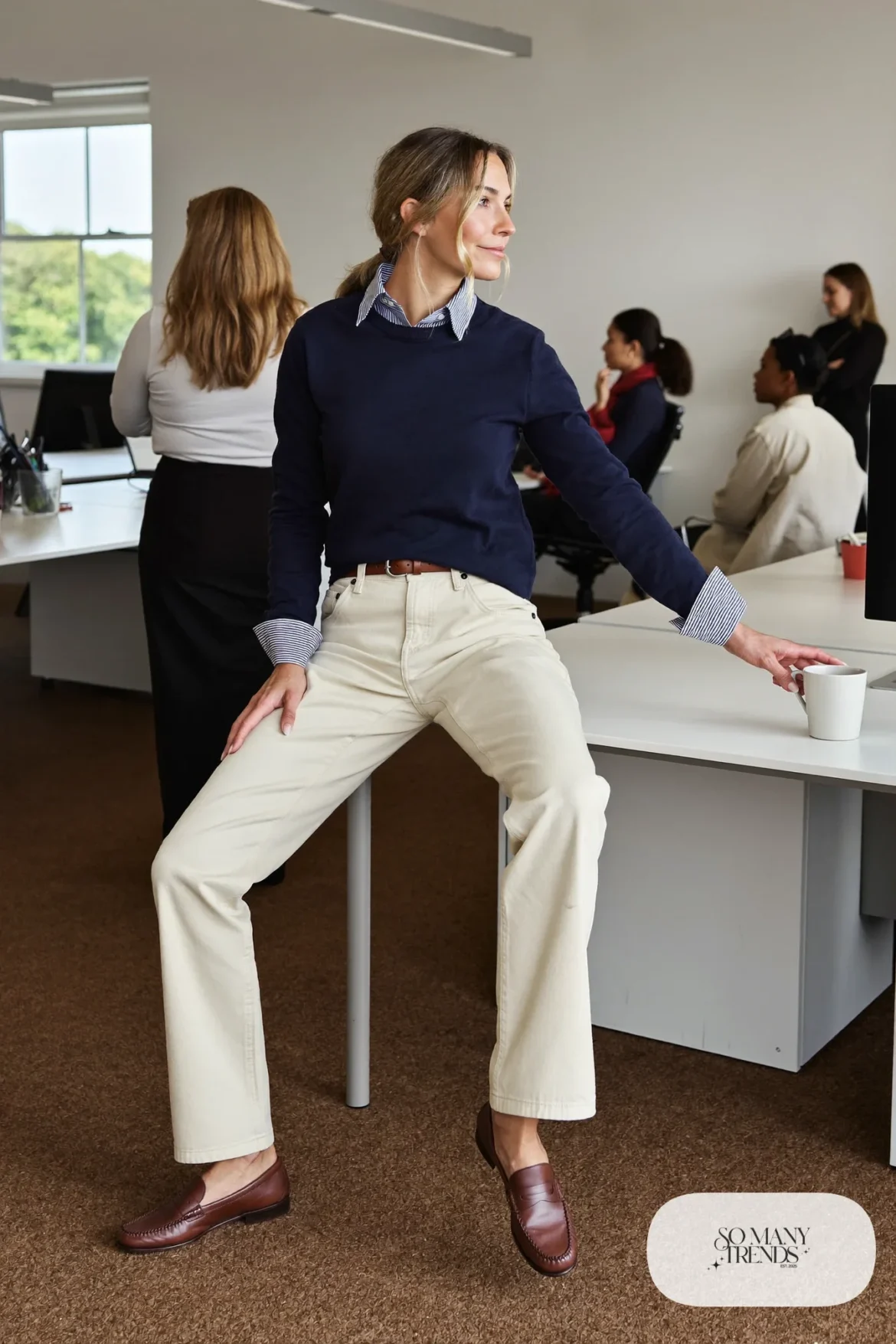 blue striped oxford shirt navy crewneck sweater cream chinos tan loafers brown leather belt outfit 5