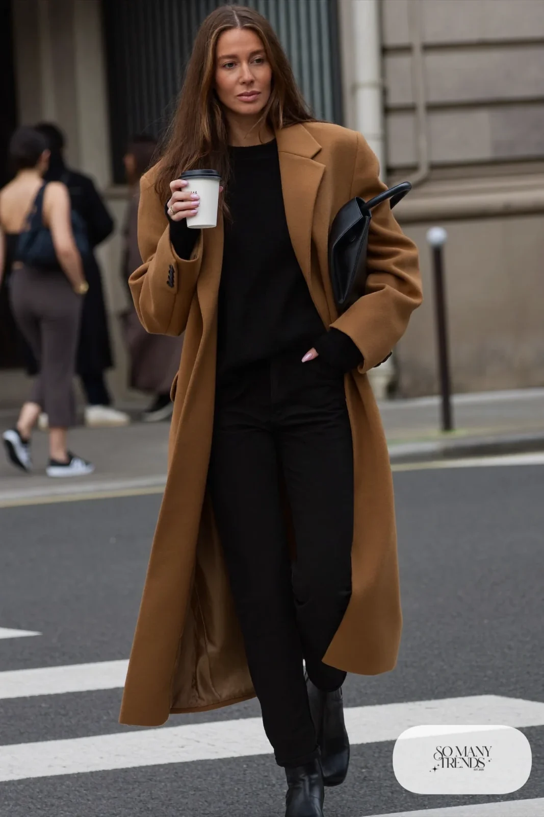long camel wool coat black fine knit sweater black straight pants black leather ankle boots outfit 6