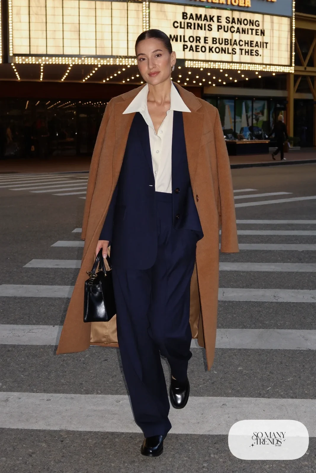 relaxed navy pant suit white blouse camel long overcoat black leather loafers structured bag outfit 26