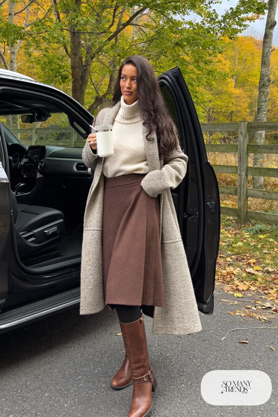 oatmeal shawl collar cardigan fine cream turtleneck brown pleated midi skirt tall brown boots outfit 12