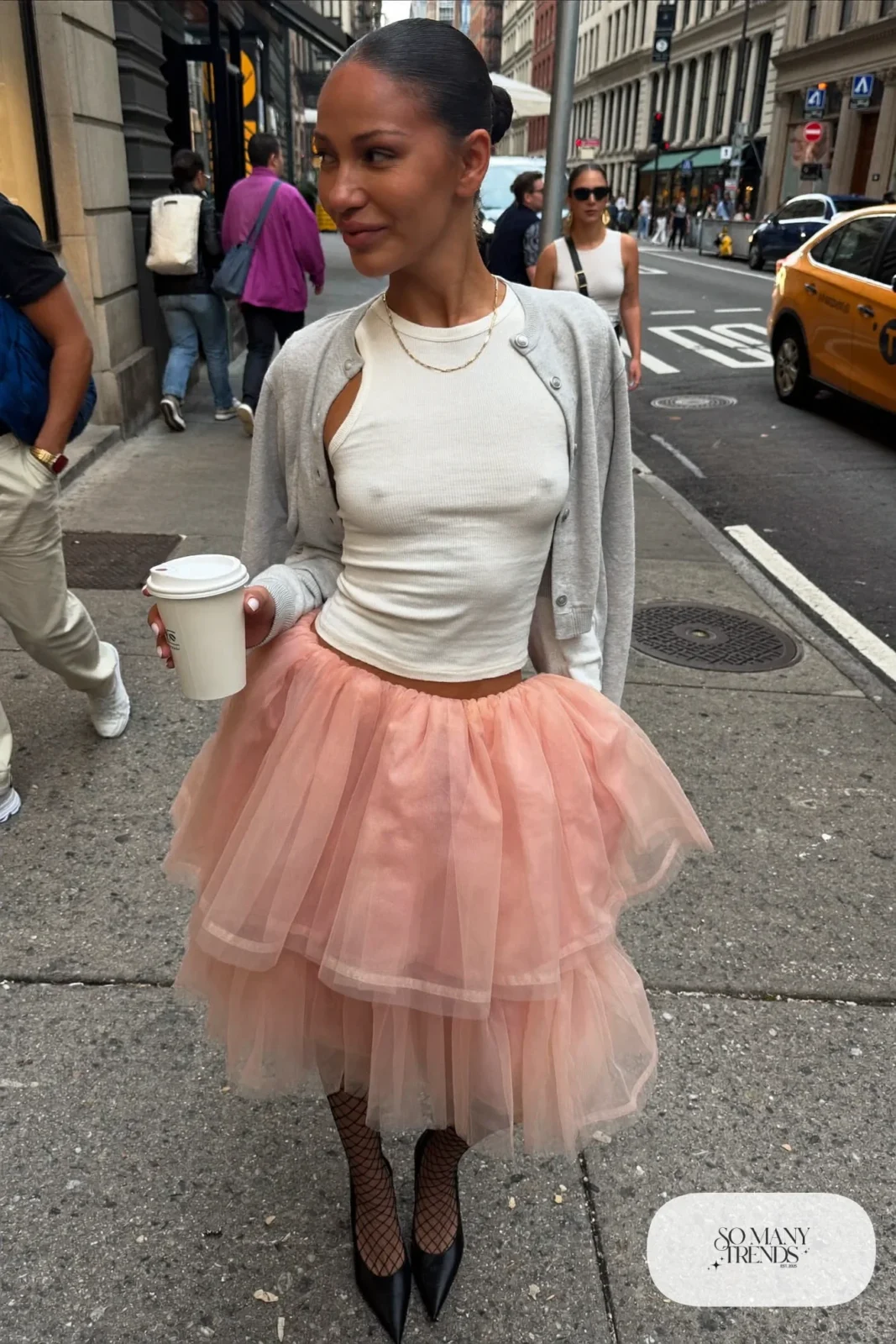 blush pink tulle midi skirt ivory ribbed tank cropped cardigan black pointed pumps outfit 1