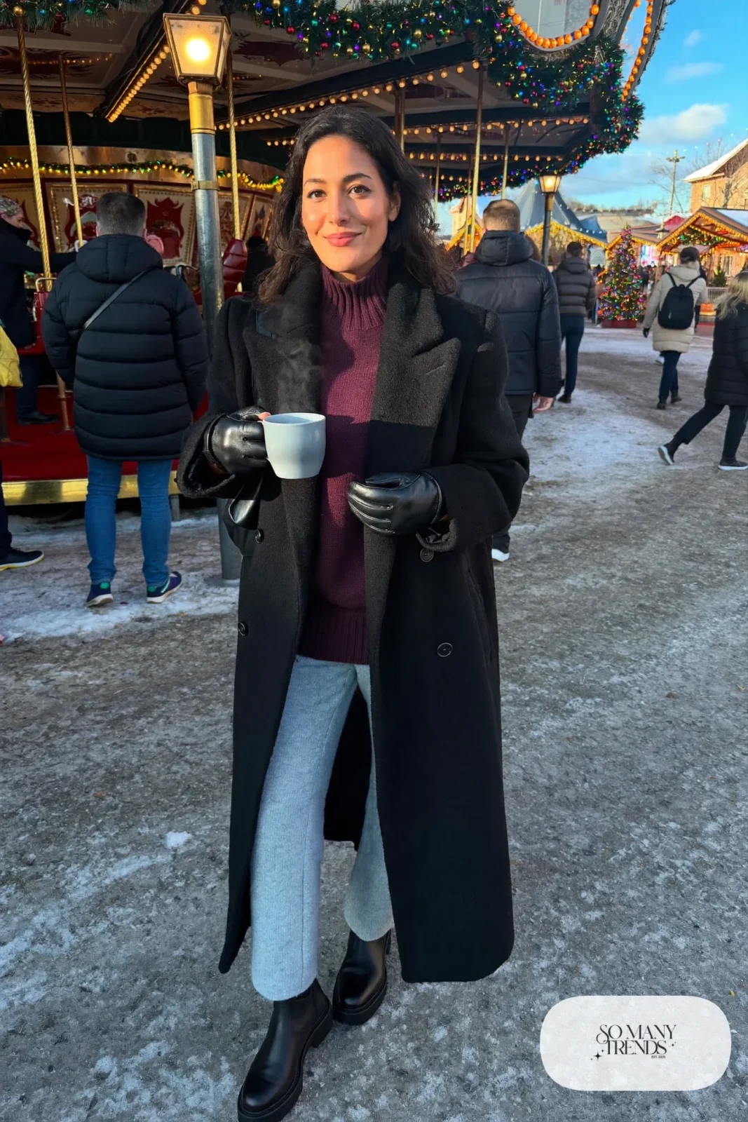 black long wool coat plum sweater gray straight pants black boots leather gloves christmas market outfit 5