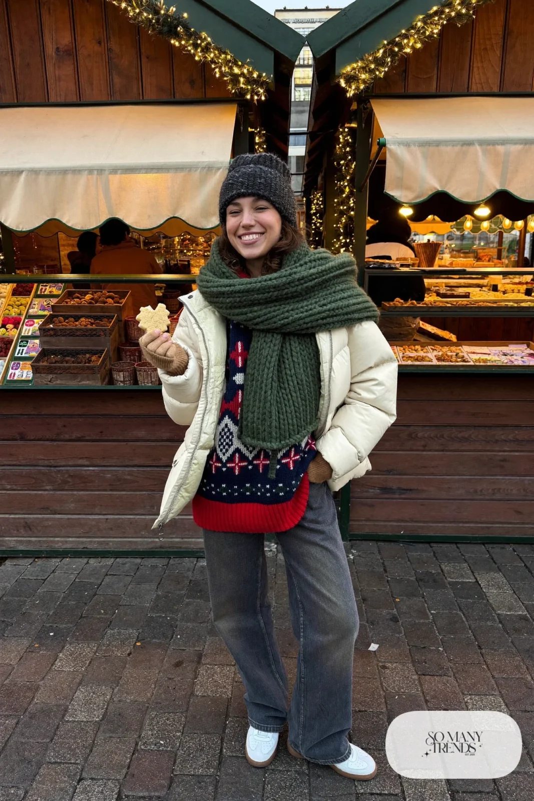 oversized fair isle sweater mid-wash straight jeans cream puffer jacket white sneakers christmas market outfit 13