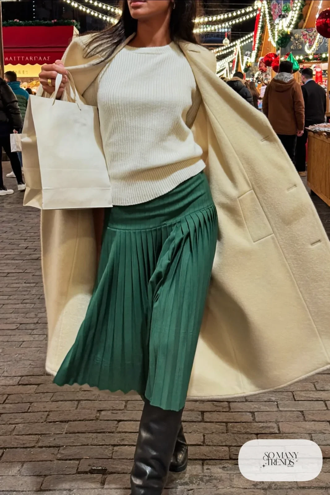 forest green pleated midi skirt cream chunky sweater opaque tights tall boots cream coat christmas market outfit 19