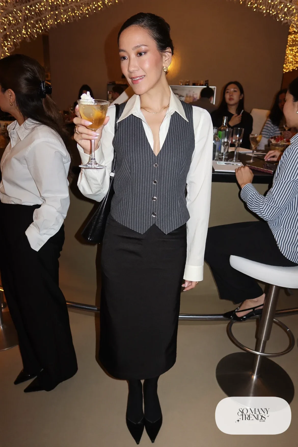 pinstripe vest white shirt black satin midi skirt black pointed pumps outfit 16