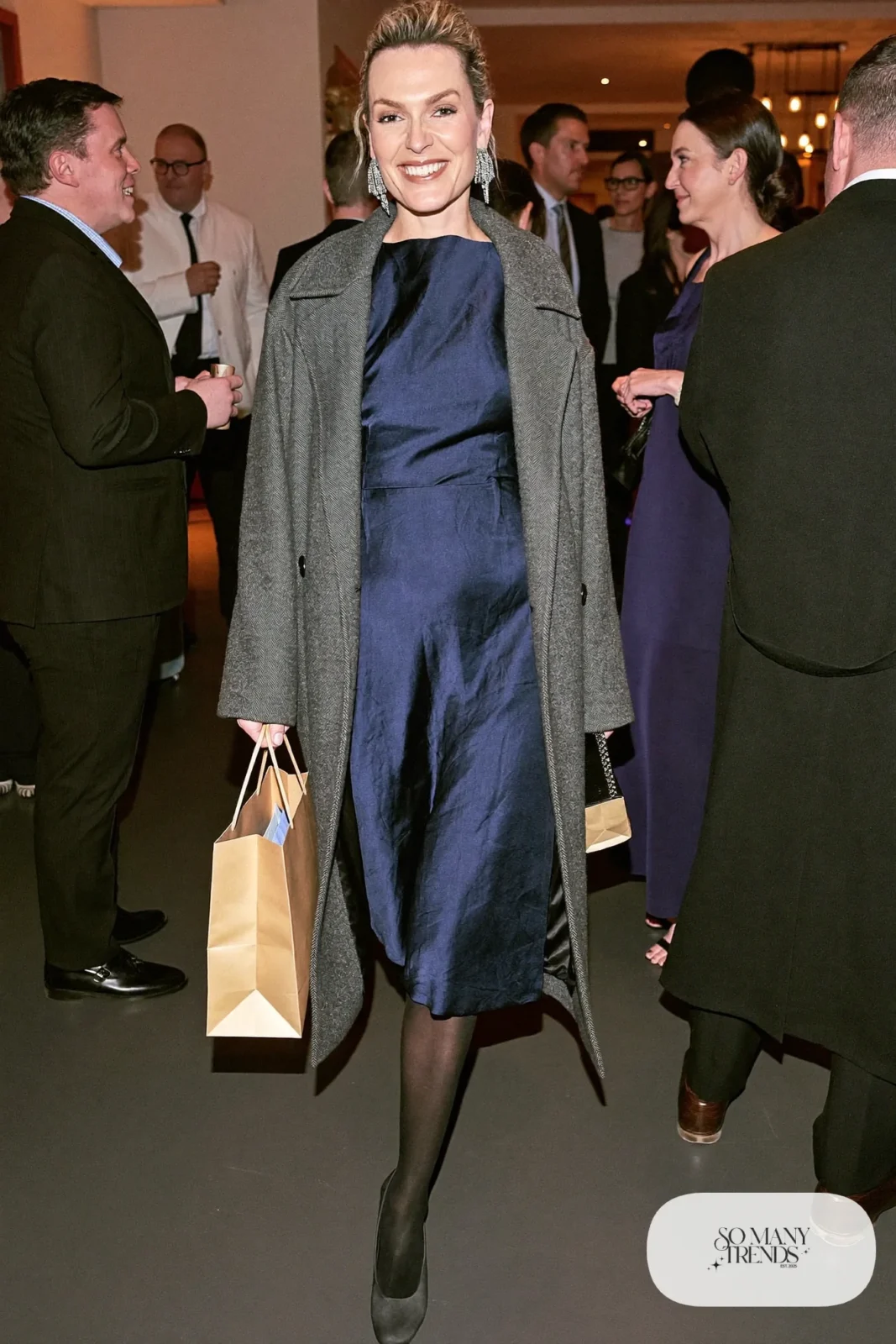navy satin midi dress long gray wool coat sheer tights black pumps silver earrings outfit 24