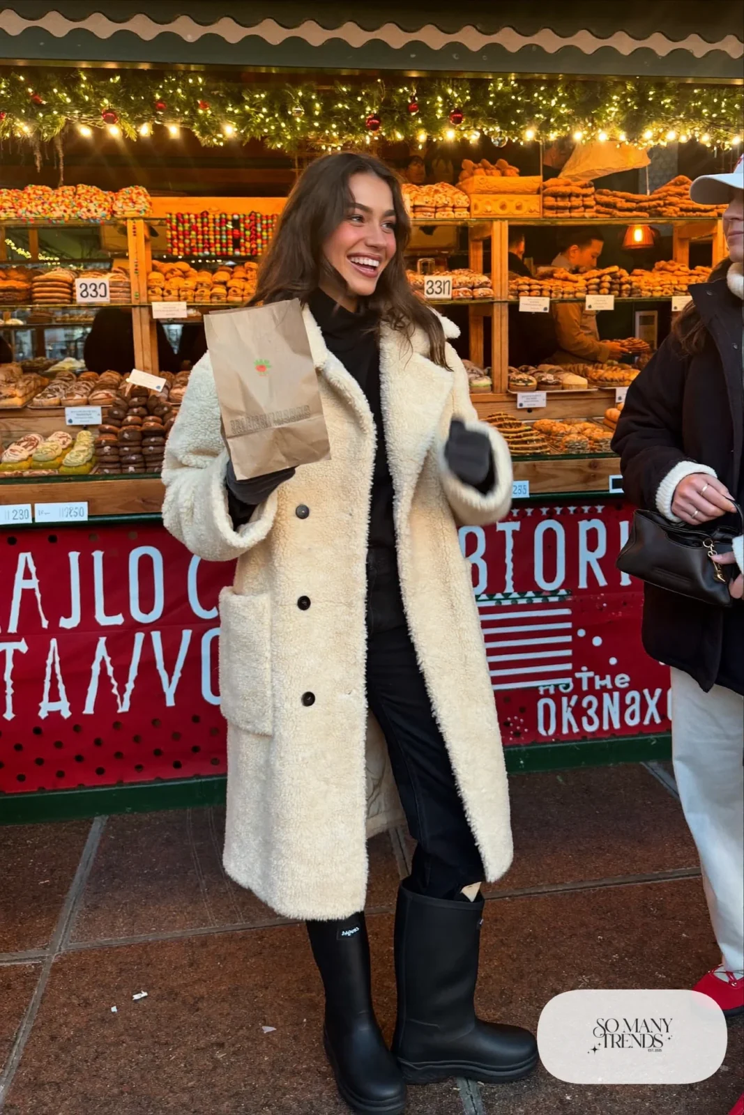cream teddy coat black turtleneck black straight jeans waterproof boots christmas market outfit 6