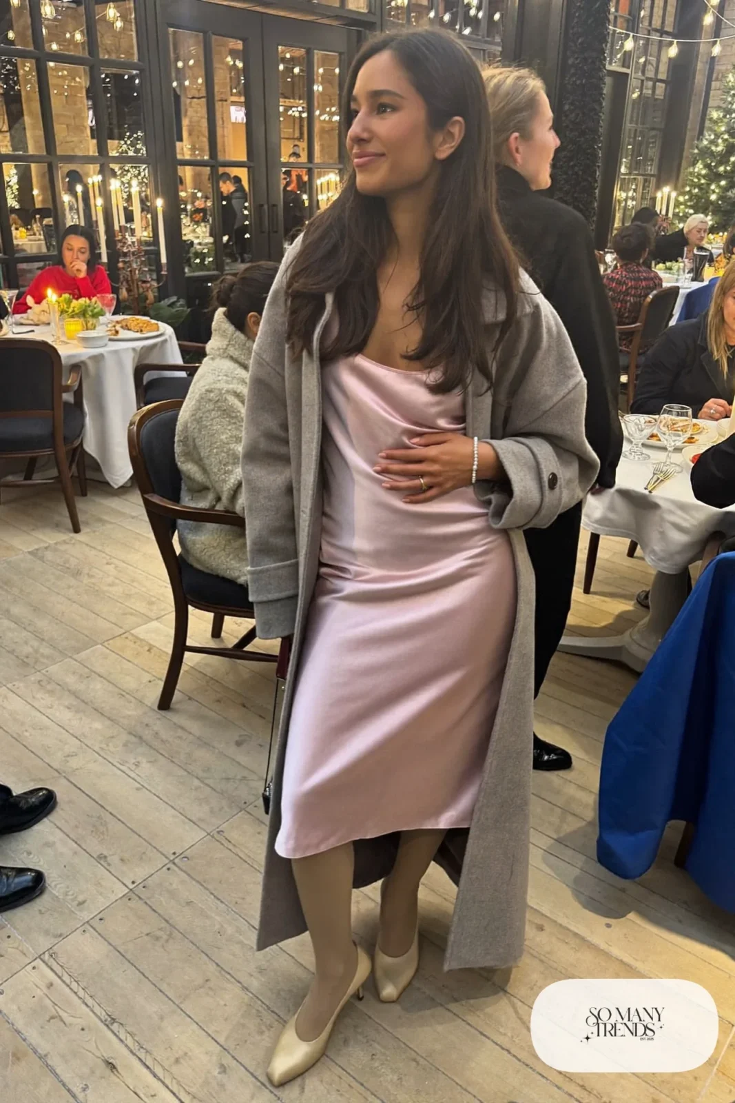 blush pink satin midi dress oversized gray coat sheer tights champagne closed pumps pearl bracelet outfit 13