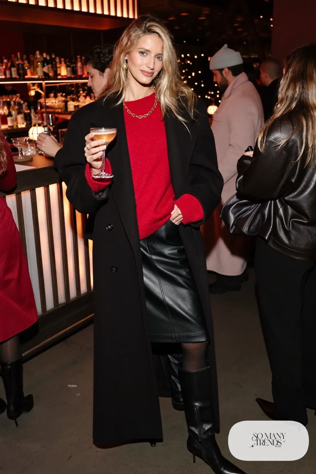 black faux leather midi skirt red knit sweater tall black boots gold chain long black coat outfit 29