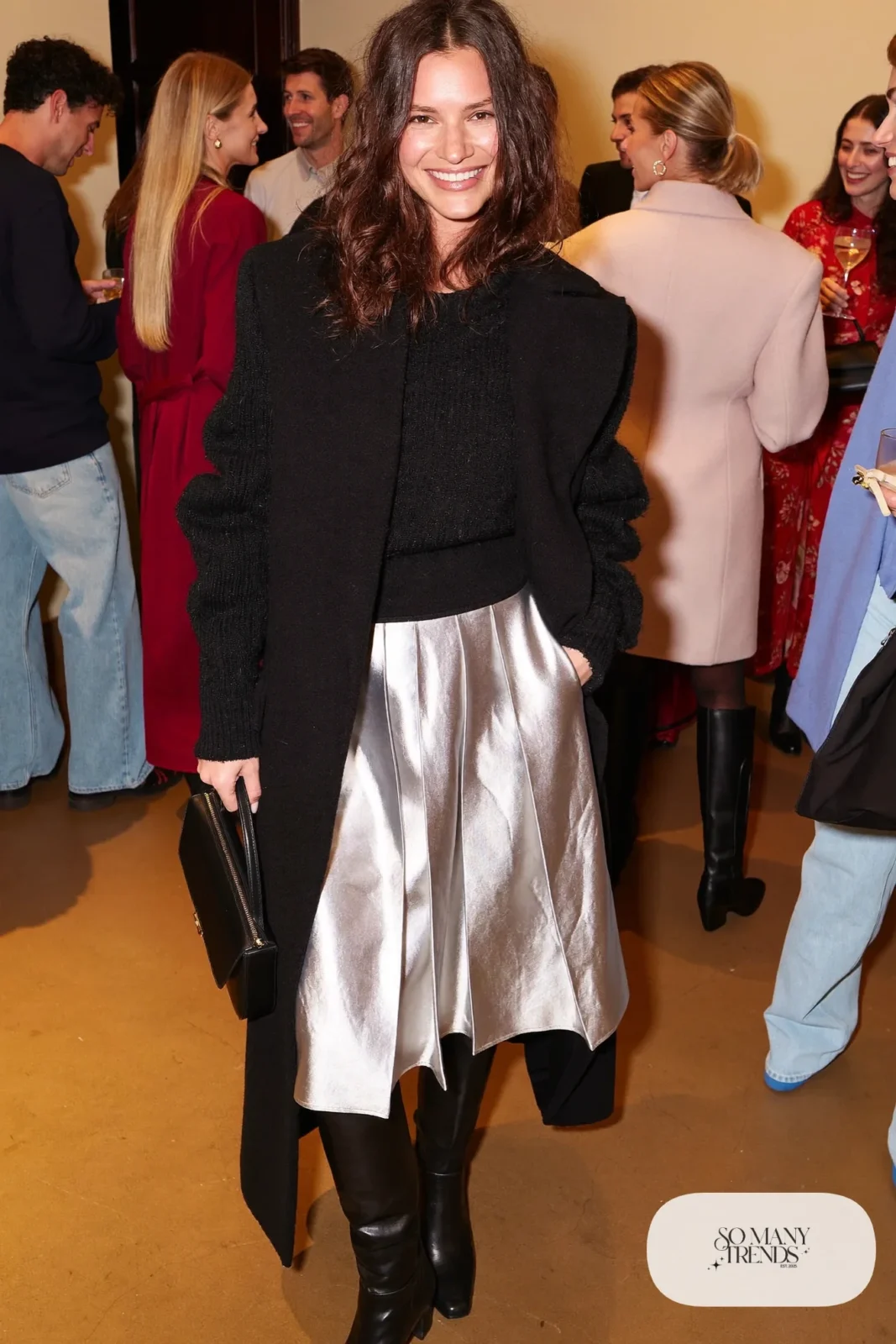silver metallic pleated midi skirt black merino sweater black opaque tights black knee-high boots long black wool coat galentines cocktail outfit 15