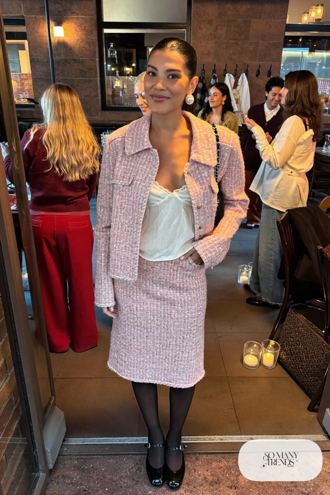 pink tweed boxy jacket and knee-length skirt set cream silk camisole sheer black tights black mary janes pearl earrings chain bag galentines dinner outfit 17