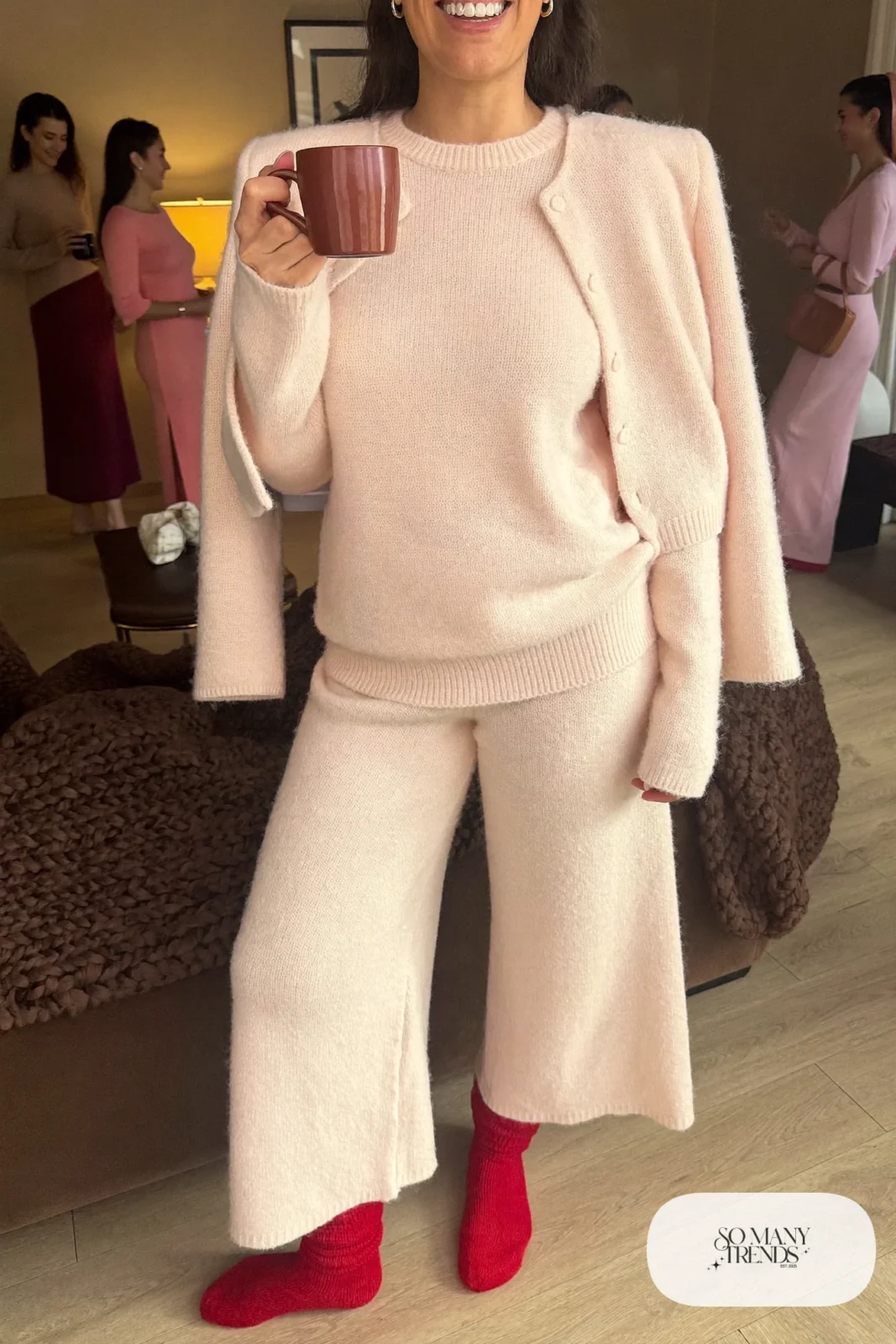 cream knit cardigan and wide-leg pants lounge set cherry red knit socks galentines movie night outfit 25