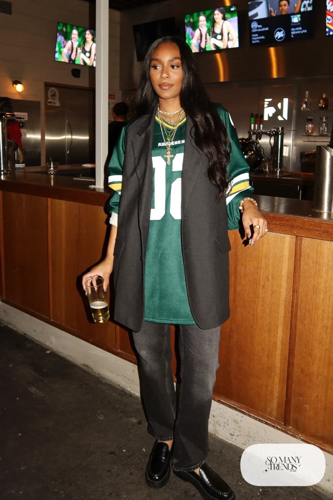 green jersey under gray oversized blazer dark straight jeans black loafers gold necklace outfit 2