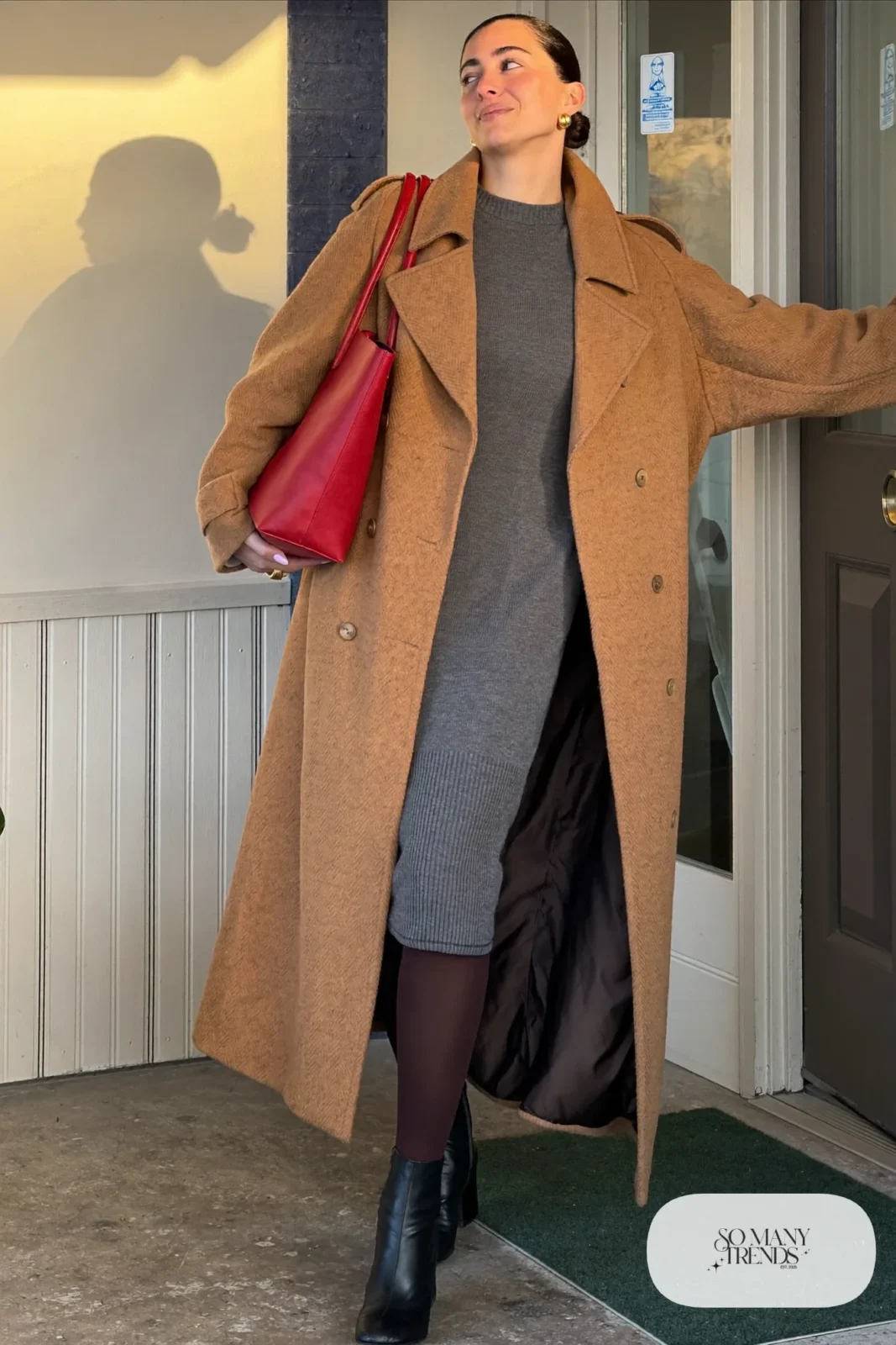 camel trench coat gray knit midi dress black ankle boots red tote bag outfit 27