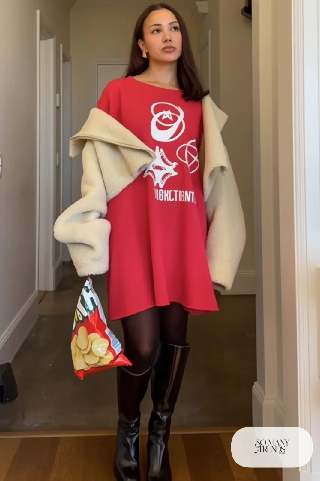red jersey dress cream shearling jacket black opaque tights tall black boots outfit 4