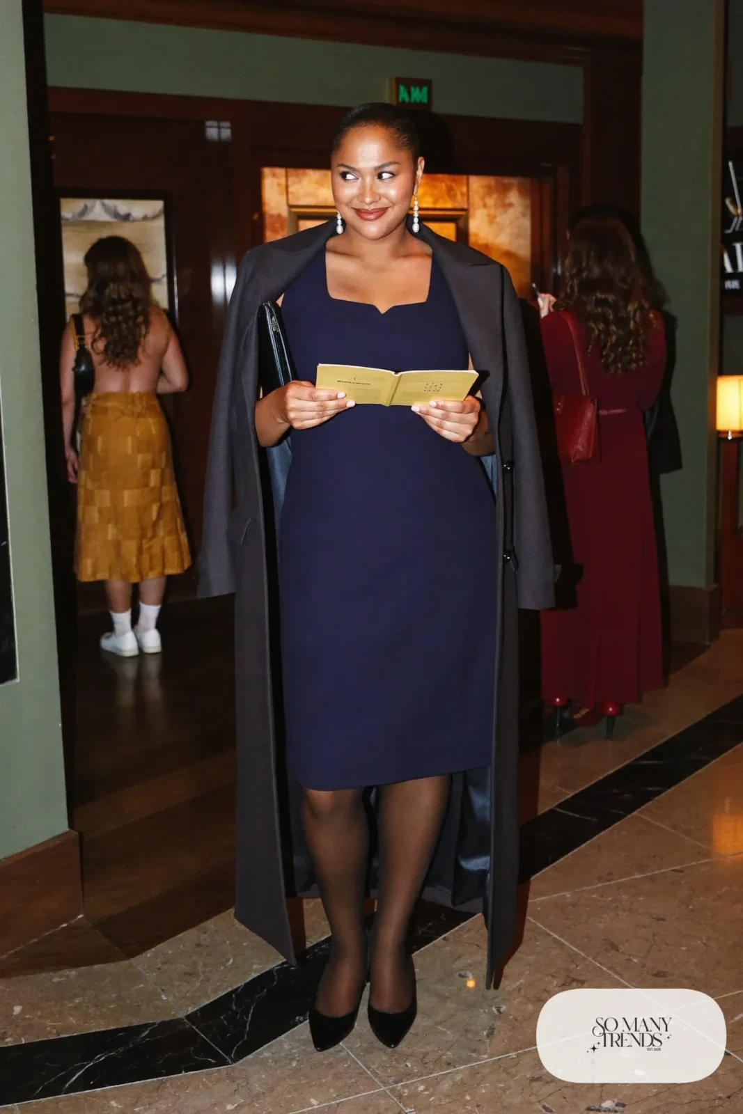 Woman in a navy ponte dress with princess seams and a square neckline with a coat and heels, outfit 16