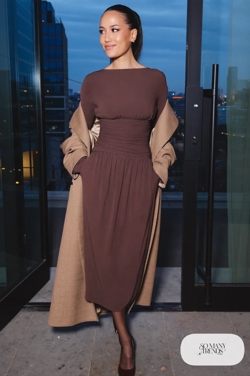 Woman with a straight athletic figure in a chocolate brown side-ruched midi dress with a sand blazer and pumps, outfit 8
