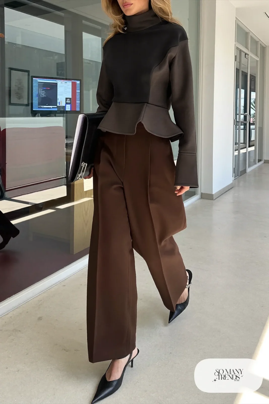 Woman with pear-shaped figure in a black peplum top, espresso wide-leg pants and pointed slingback mules, outfit 8