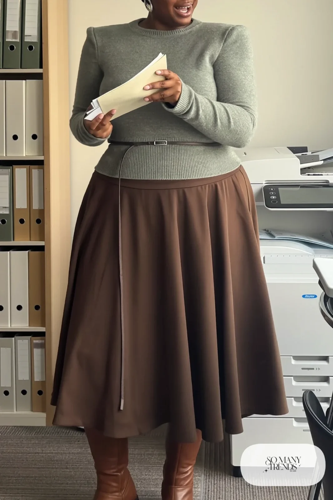 Woman in oatmeal wool-blend sweater with a thin belt, long espresso A-line skirt and brown ankle boots under a long hem, outfit 10