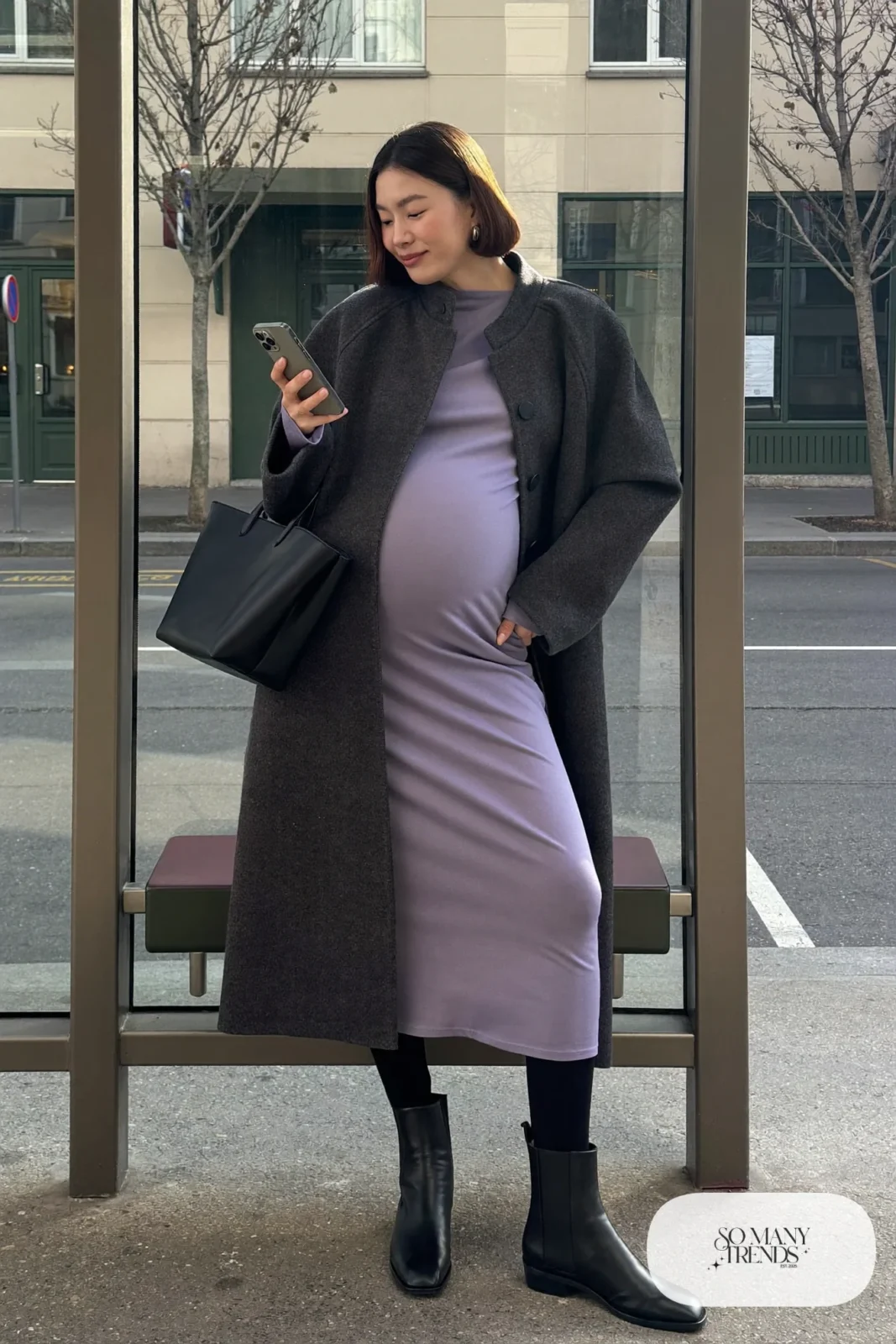 Long charcoal wool-blend coat over lavender maternity midi dress with black ankle boots - outfit 21