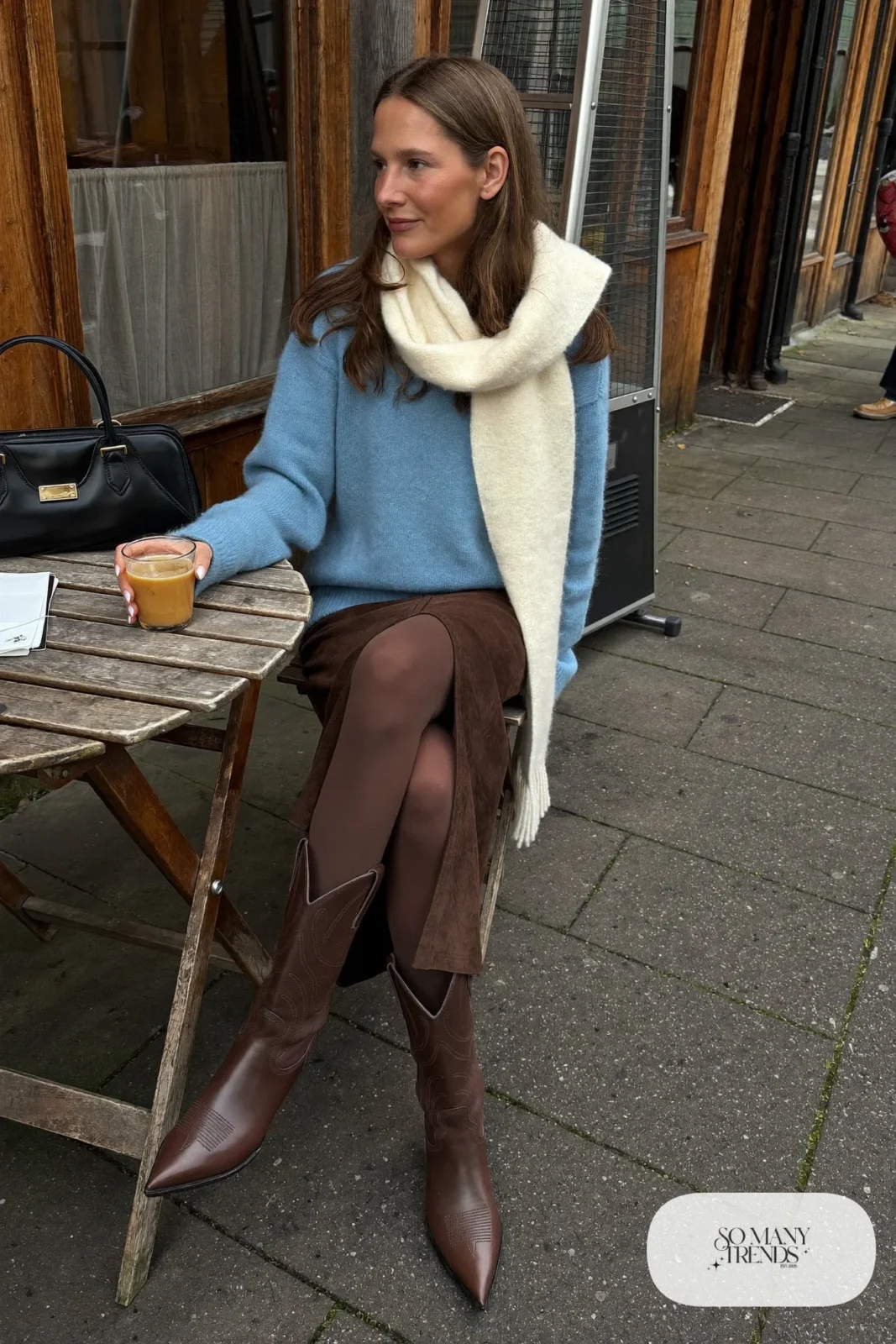 Powder blue knit sweater, chocolate brown suede midi skirt, opaque brown tights and brown cowboy boots, outfit 3