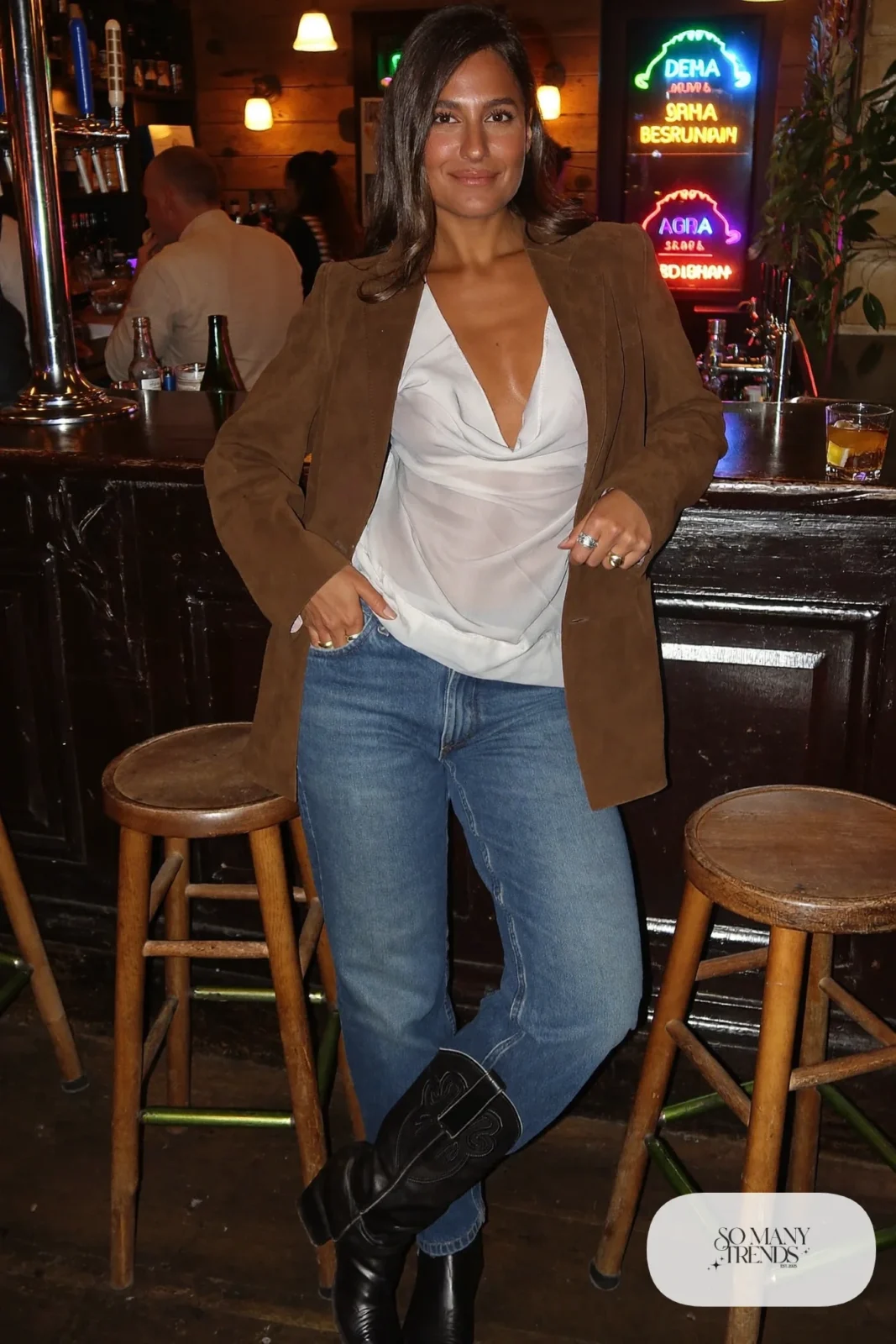 Cream satin cowl top, bootcut jeans, brown suede blazer and black cowboy boots, outfit 10