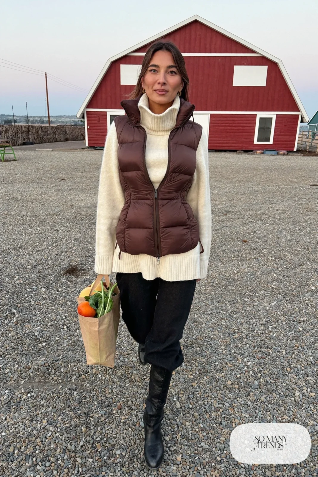 Quilted brown vest, chunky cream turtleneck, wide black jeans and black cowboy boots, outfit 16