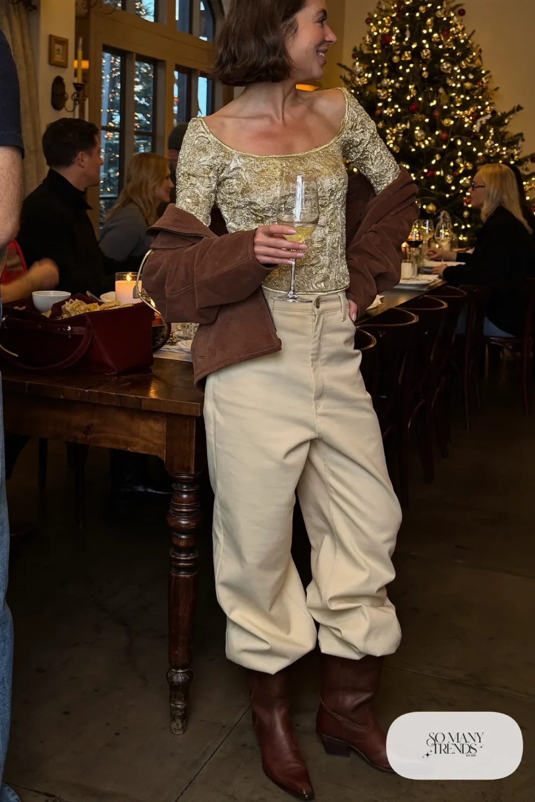 Gold-thread knit top, wide cream crepe pants, brown suede jacket and brown cowboy boots, outfit 24